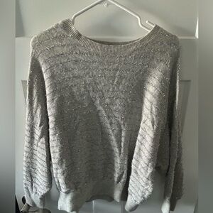Women's gray sweater with silver stripes. Size medium.